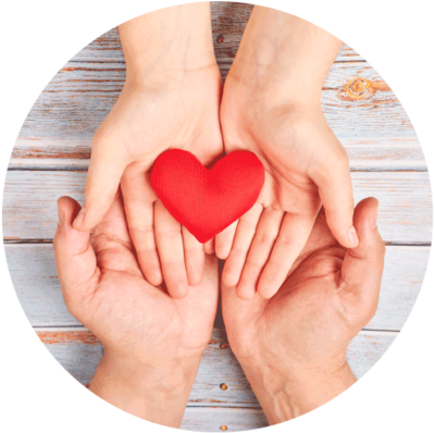 hands holding paper heart